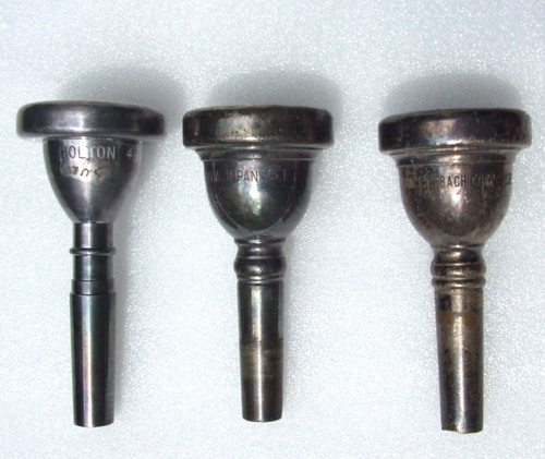 Three vtg trombone mouthpieces - three,